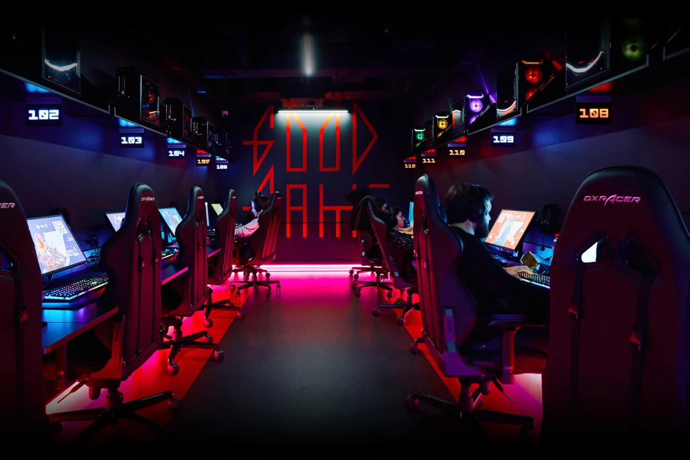 Numbered computers during an evening session.