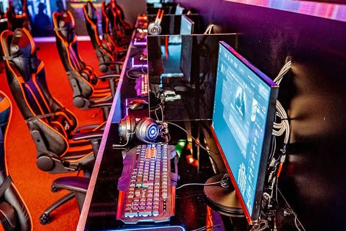 Gaming stations under red light.